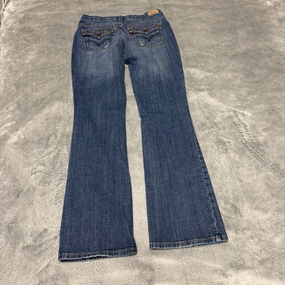 Levis 515 Womens Jeans Size 6M Blue Boot Cut Riveted Button Flap Pockets Red Tab